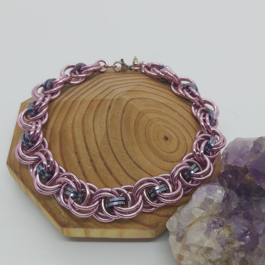 Oceans Weave bracelet, made with anodized aluminum rings