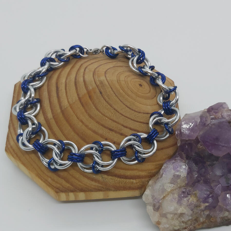 Celtic Spiral Weave bracelet, made with anodized aluminum rings.