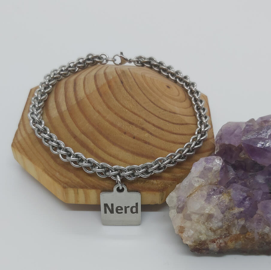 JPL3 bracelet, made with stainless steel rings and Nerd charm.