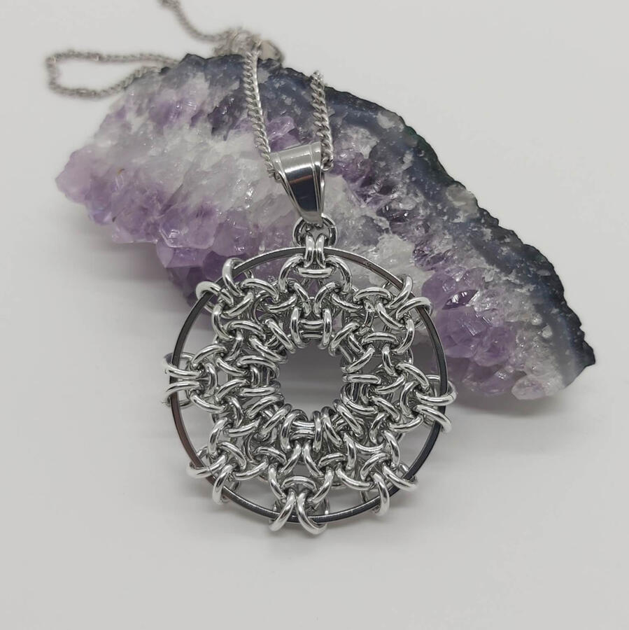 Hex Pendant, made with anodized aluminum and stainless steel.