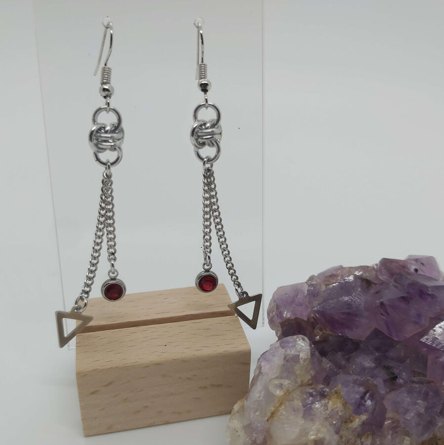 Diplopia Earrings, made with anodized aluminum rings, and stainless steel chain, charms, and drops.