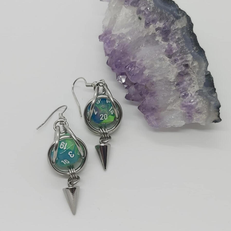 Caged Mini D20 earrings made with stainless steel